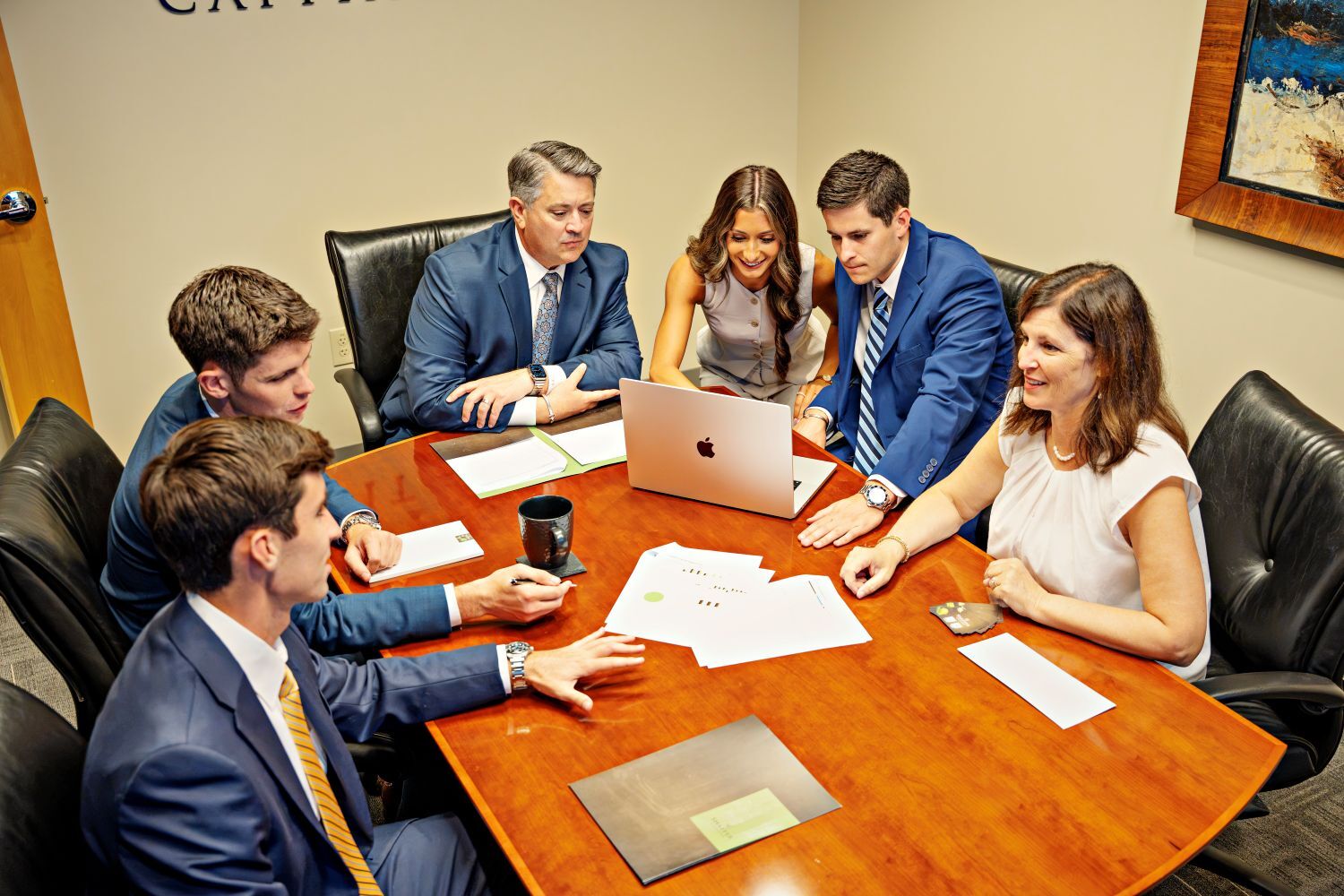 Shaffer Capital team working at a table